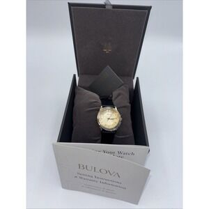 Bulova 97V25 Round Gilt Dial Women's Watch W/Black Leather Strap New W/tags